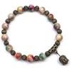 Handmade Bracciale in perle di giada bianca tinte multicolore con pendente a forma di testa di Buddha, stile bohémien vintage, ottone anticato, Made in France