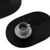 FunWheat Set di 4 tovagliette ovali intrecciate per tavoli da pranzo, lavabili, resistenti al calore, per uso interno ed esterno, 30 x 45 cm (ovale nero, 4 pezzi)