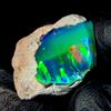 AK GEMS AND JEWELLERY Ethiopian Fire Black Opal Grezzo Naturale 22 Ct 22x21 mm 1 Pietra