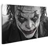 bilderfelix Quadro su tela Primo piano inquietante di un uomo in costume e trucco da Joker - Tela 100x57 cm