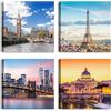 LuxHomeDecor Set di 4 quadri 30x30 cm - stampa su tela con telaio in legno - paesaggi urbani con Big Ben, Torre Eiffel, skyline di New York e San Pietro a Roma