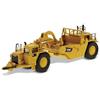 Diecast Masters 85542 - Cat 657G Trattore a ruote con ruspa, scala 1:125; da 14 anni, in scatola di latta, adatto a collezionisti
