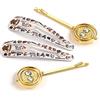 Harry Potter The Carat Shop - Set di fermagli per capelli ufficiale Time Turner