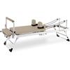 TOORX [Reformer Pilates PTX-200 Pieghevole] Metallo Salvaspazio Home Gym | Linea LIVENESS | 5 Molle in Acciaio Temprato, Footbar 7 Livelli, Jumpboard Incluso, 8 Ruote TPR e Portata Massima 120 kg