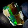 AK GEMS AND JEWELLERY Opale Naturale Etiope Grezzo Nero, Pietra Preziosa Fire Opal 25 Ct 25x22 mm