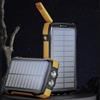 RESTEQ Powerbank Solar 20000mAh con ricarica senza fili, lampada LED e resistenza IP66 per viaggi