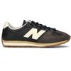NEW BALANCE Sneaker uomo nera in pelle