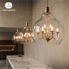 CAREN Lampadario Gigante Caren Lighting Dreamy Light, Nero Elettroplaccato con Vetro Trasparente, Pendente King Edison Ghost Soffiato a Mano
