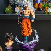 Bandai Dragon Ball Super Ultra Instinct Son Goku Figura 21cm Scala 1/8 Statua GK Goku con Danni da Battaglia e Base con Effetti Speciali Figura Anime