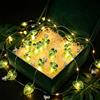 YeahBoom Ghirlanda luminosa con foglie di palma - 2 m - 20 foglie LED - Funziona con pile - Ghirlanda luminosa tropicale hawaiana - Per festa hawaiana, feste estive, decorazione da spiaggia